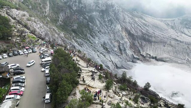 Tangkuban Parahu Mountain - The Overturned Boat with Astonishing View, an active volcano, in Lembang, Bandung. Vibrant Daytime Gathering in Nature's Majestic Mountain Landscape.