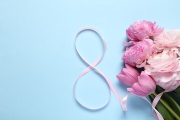 8th of March greeting card design with pink ribbon, beautiful flowers and space for text on light blue background, flat lay. International Women's day
