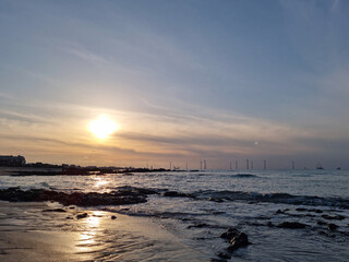 Fototapeta na wymiar This is the sunset view of Gwakji Beach in Jeju Island.
