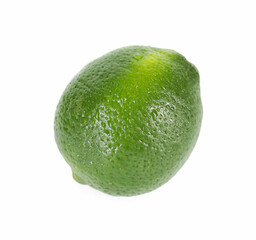 One whole fresh lime with water drops isolated on white