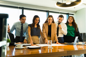 Female partners and bosses leading a meeting with some other businesspeople