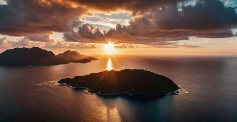 Tuinposter The sun peeks over the crest of an island mountain, over the surrounding sea and clouds. Generative AI. © zax