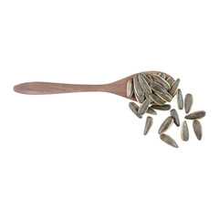 Sunflower seeds on a wooden spoon isolated transparent