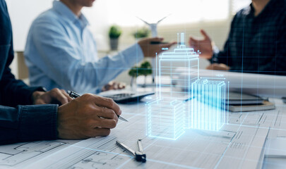 Architects engineer contractor working in office with blueprints and building hologram, Team work...