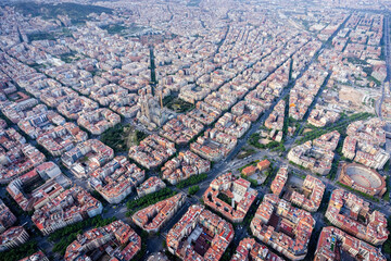 Aerial wide angle view of Barcelona Eixample residencial district, Spain. Late afternoon light