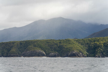 Wilderness rocky coastline landscape on the coast along the world heritage national park in the southwest Tasmania Australia 