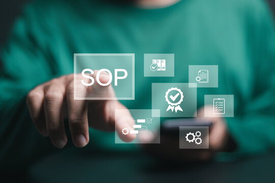 SOP, Standard operating procedure concept. Person touch SOP icons on virtual screen for the standard operating procedure with instruction, quality, process, operation, sequence, workflow.