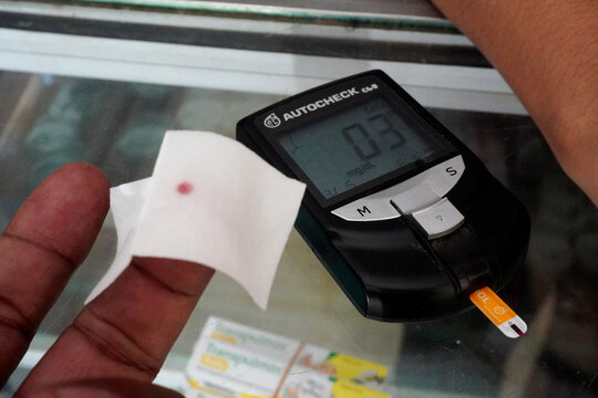 blood check to check cholesterol, uric acid and sugar levels on May 30, 2022 in Tarakan, Indonesia
