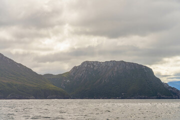 Wilderness rocky coastline landscape on the coast along the world heritage national park in the southwest Tasmania Australia 