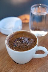 a cup of turkish coffee on table 