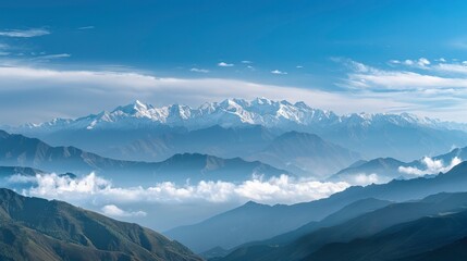 Fototapeta na wymiar Majestic Snow-Capped Mountains, Towering Peaks Shrouded in Clouds, Evoking a Sense of Grandeur and Serenity.
