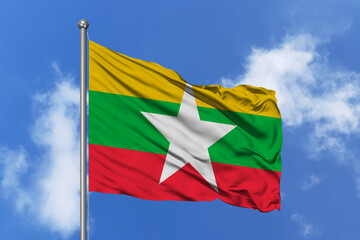 Myanmar flag fluttering in the wind on sky.