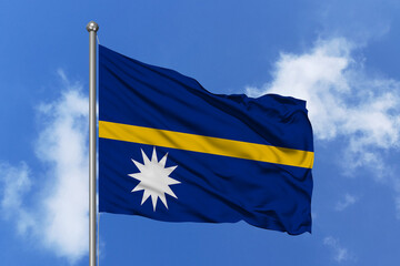 Nauru flag fluttering in the wind on sky.