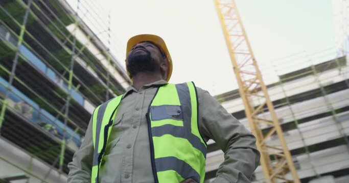 Black man, architect and inspection on construction site for building, industrial architecture or management. African male person, contractor or civil engineer checking concrete structure and safety