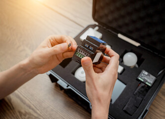 A technician works with a demo kit of the smart home system