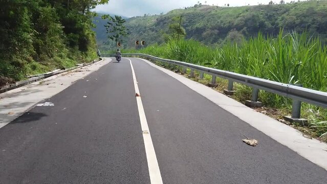Timelapse video of the bike ride to the start of the trek for Madakaripur Waterfalls in East Java, Indonesia