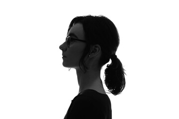 Silhouette of profile of Caucasian woman.