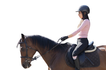 Close up of a young woman riding a horse in an equestrian center, while taking riding lessons
