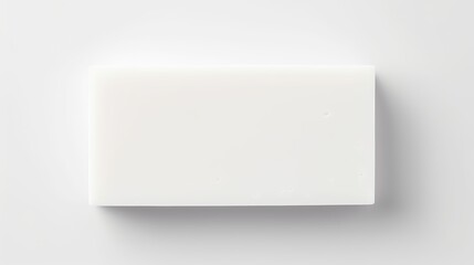 Soap bar and foam on white background, top view. Mockup for design