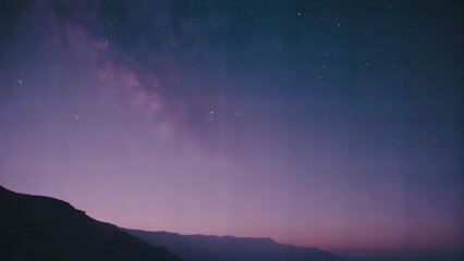 purple and blue sky with stars and a mountain in the background