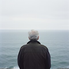 Fototapeta premium senior person watching the sea