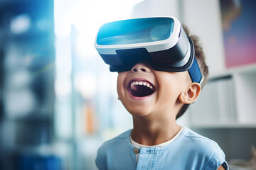 Laughing child boy with VR glasses