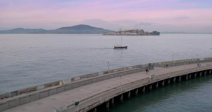 Aerial: Alcatraz from aquatic park pier in San Francisco, USA