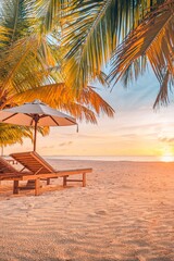 Beautiful tropical sunset coast, two sun beds chairs umbrella under palm trees. Closeup white sand, sea view horizon colorful twilight sky calm and relaxation. Inspire beach resort tourism landscape
