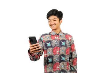 PNG Image of A young boy wearing Batik with expression