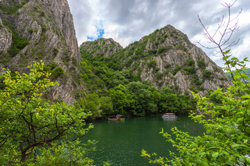 North Macedonia. Excursion boats in the popular tourist Matka Canyon. Attractions. Trips. - obrazy, fototapety, plakaty