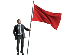 Confident businessman looking upwards, holding a large red flag, isolated on white