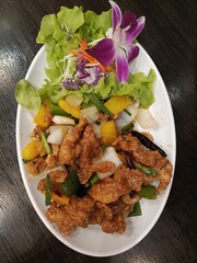 Stir-fried chicken with cashew nuts.