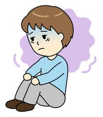 うつ病で気分が落ち込む体育座りの若い男性