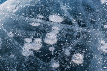 Patterns on the ice of lake Baikal. Closeup. Irkutsk region, Eastern Siberia, Russia - 739135530