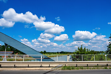Bridge and blue sky with clouds