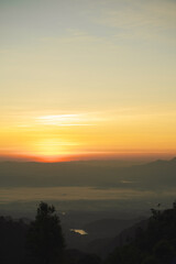 landscape and travel concept with sunrise and layer of mountain background