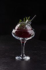 Alcoholic cocktail on black background