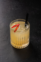 Alcoholic cocktail on black background