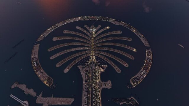 Top night aerial view with drone at The Palm Jumeirah. Dubai. United Arab Emirates. UAE