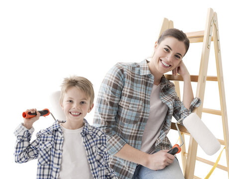 Happy woman and child painting their home