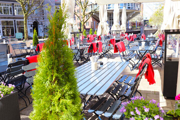 Naklejka premium city landscape. summer cafe on the city street