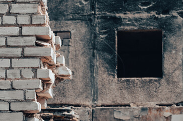 window of a burnt and destroyed house in Ukraine
