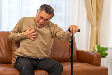 Senior asian adult elderly man with chest pain suffering from heart attack, health and medical,...