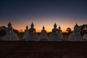 Sunrise with white Buddha in the morning