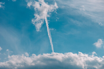 contrail of a rocket launch in the blue sky in Ukraine