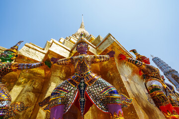 Giant carrying a pagoda base in Wat Phra Kaew. Here are the main tourist attractions in Bangkok, Thailand.