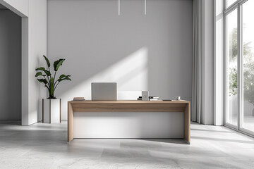 A minimalist office with a single laptop on the desk