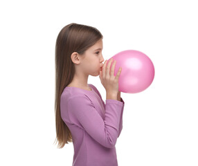 Girl inflating pink balloon on white background