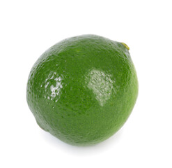 One whole fresh lime isolated on white