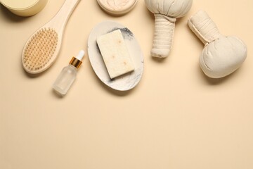 Bath accessories. Flat lay composition with personal care products on beige background, space for text